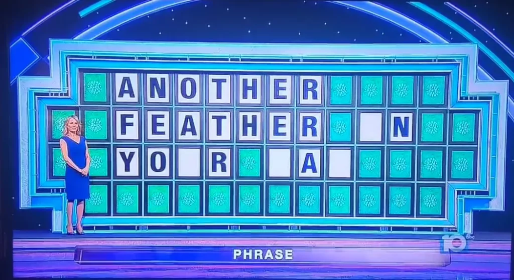 Participantes de 'Wheel of Fortune' no momento 'The Feather in Your Hat'